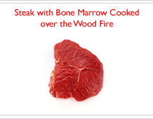 Steak with bone marrow cooked over the wood fire